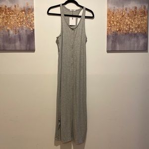 Grey dress button up, thin straps, slit at bottom by knees in the front.